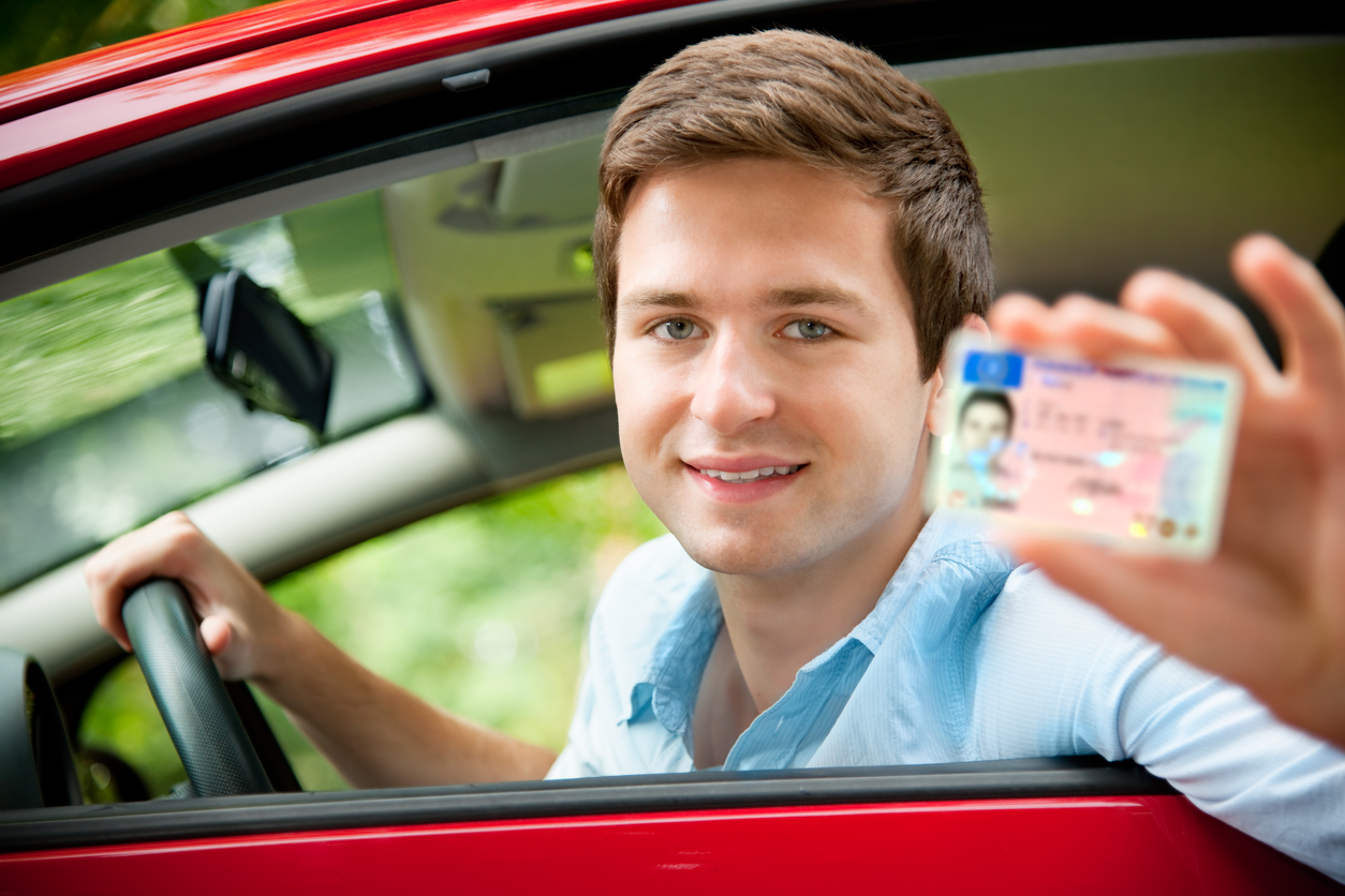 When can an immigrant living in the U.S. legally obtain a driver’s license?